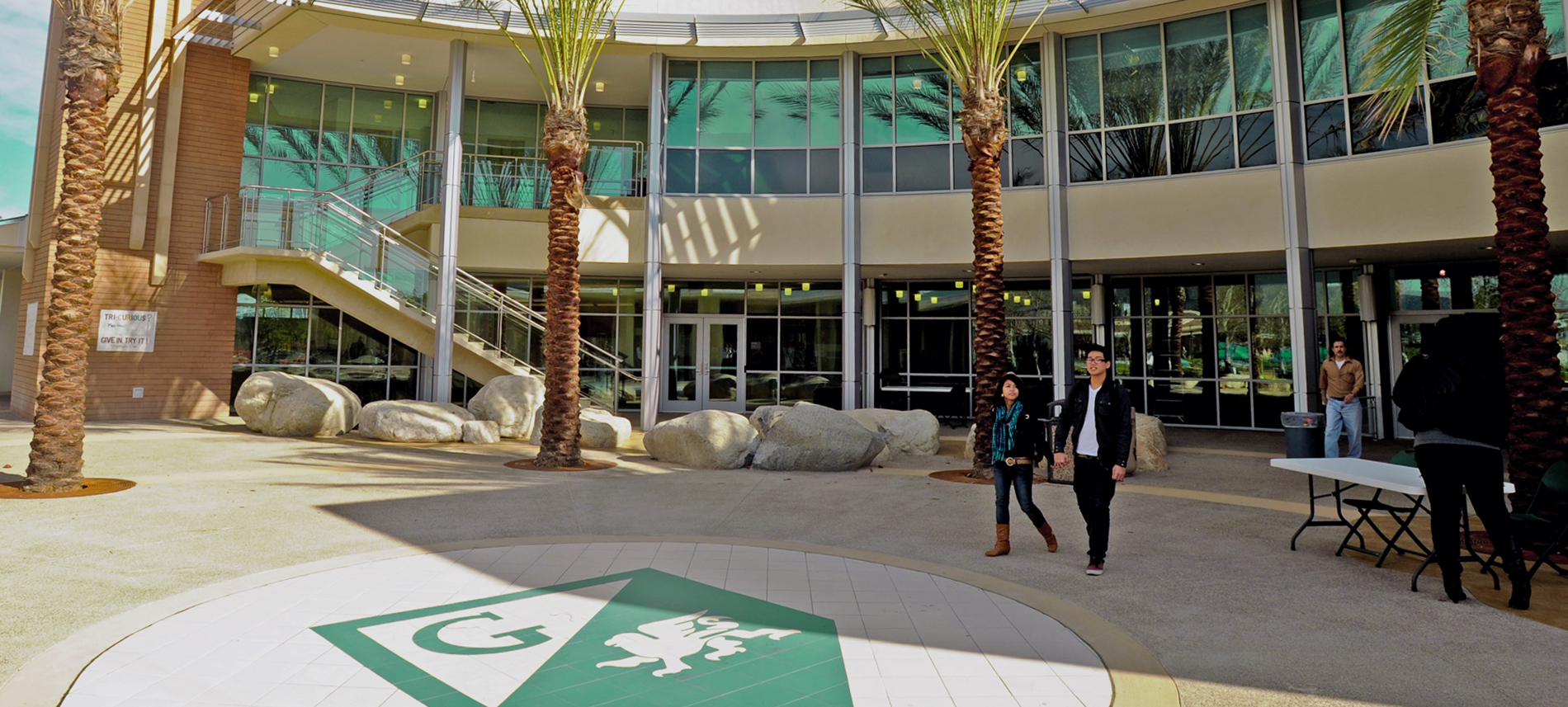 Two students walking outside the Griffin Center